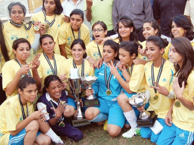 young rising stars fc retain women s football title