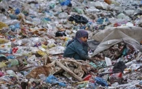 garbage dumping site becomes a bane