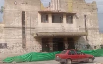 three booked in nishat cinema land grab