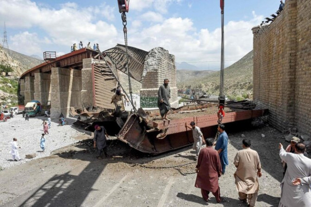 key railway bridge in balochistan hangs over dry river bed after deadly attack key railway bridge in balochistan hangs over dry river bed after deadly attack