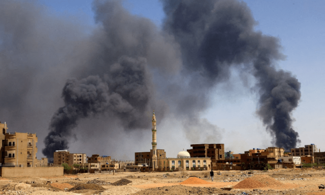 a man walks while smoke rises above buildings after aerial bombardment during clashes between the paramilitary rapid support forces and the army in khartoum north sudan on may 1 photo reuters a man walks while smoke rises above buildings after aerial bombardment during clashes between the paramilitary rapid support forces and the army in khartoum north sudan on may 1 photo reuters