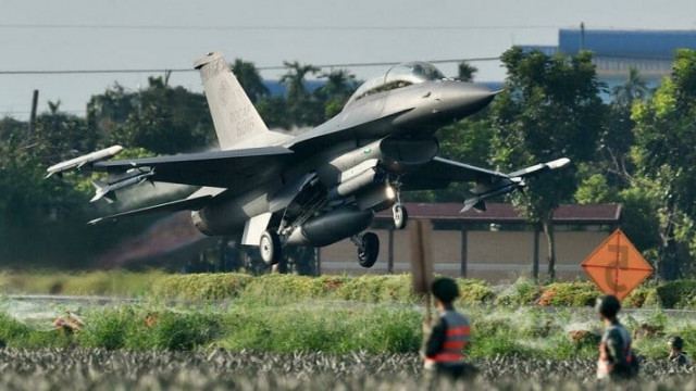 a us made f16 fighter jet takes off from a motorway in pingtung southern taiwan photo afp a us made f16 fighter jet takes off from a motorway in pingtung southern taiwan photo afp