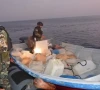 this screengrab taken from a handout video released by pakistan navy shared on october 17 2024 shows pakistan navy personnel seizing drugs during a targeted operation in the north arabian sea photo pakistan navy