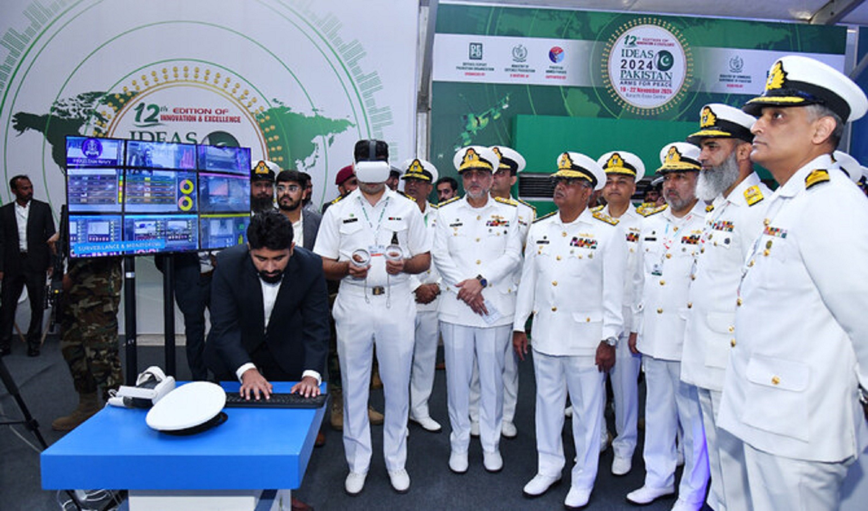 pakistan naval chief admiral naveed ashraf 4r receives briefing at the international defense exhibition and seminar ideas 2024 in karachi on november 20 2024 photo pakistan navy