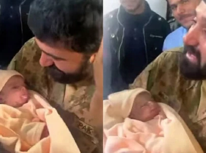 army officer adopts infant girl rescued after being buried alive