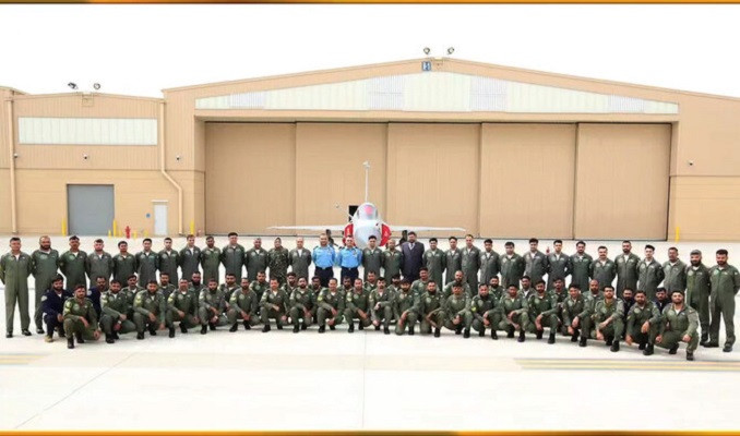 this handout photo from february 14 2025 shows paf contingent posing for a group photograph on arrival in pakistan following their participation in exercise spears of victory 2025 courtesy paf