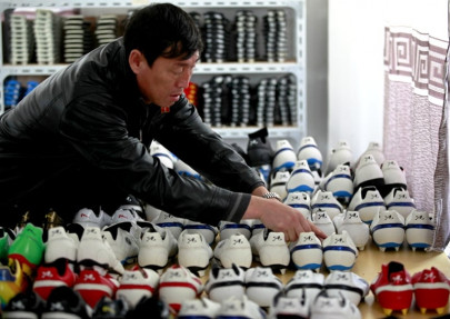 north korean bootmakers want to score with messi