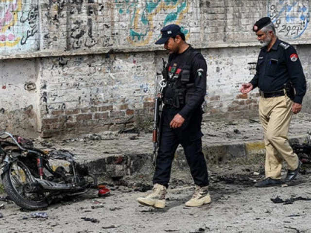 security personnel examine the site of a blast in northwest peshawar in khyber pakhtunkhwa on march 10 2024 photo afp security personnel examine the site of a blast in northwest peshawar in khyber pakhtunkhwa on march 10 2024 photo afp