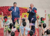 children hold chinese and us flags during the welcome ceremony for us president donald trump by chinese president xi jinping at the great hall of the people in beijing photo reuters