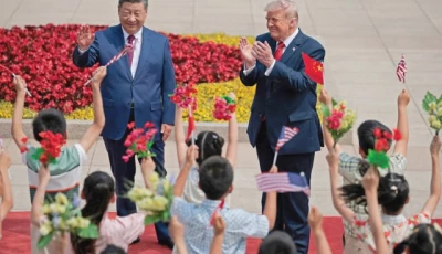 children hold chinese and us flags during the welcome ceremony for us president donald trump by chinese president xi jinping at the great hall of the people in beijing photo reuters