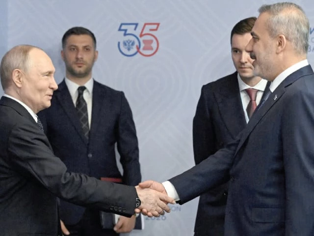 russian president vladimir putin shakes hands with turkish foreign minister hakan fidan during a meeting on the sidelines of the russia asean summit in kazan russia photo reuters russian president vladimir putin shakes hands with turkish foreign minister hakan fidan during a meeting on the sidelines of the russia asean summit in kazan russia photo reuters