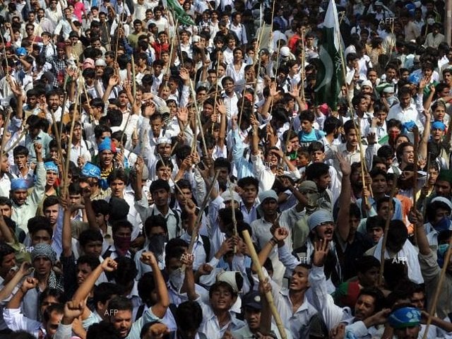 pakistani activists of the hardline sunni party ji shout anti us slogans near the us consulate during a protest against an anti islam movie in lahore on september 19 photo afp