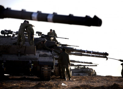 israeli raids kill children despite rocket fire lull gaza death toll rises to 49