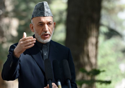 karzai accuses us of breaching prison pact