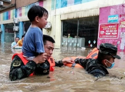 21 killed as heavy rains drench china