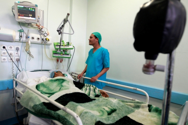 a doctor checks up on a patient at al thawrah hospital in sanaa photo afp