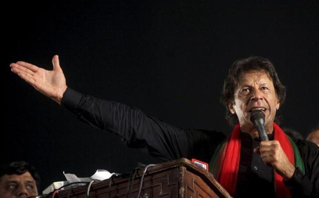 imran khan cricketer turned politician and chairman of the pakistan tehreek e insaf pti political party addresses his supporters during a by election campaign rally in lahore pakistan october 9 2015 photo reuters