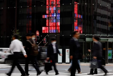 japan revises up growth outlook on stimulus
