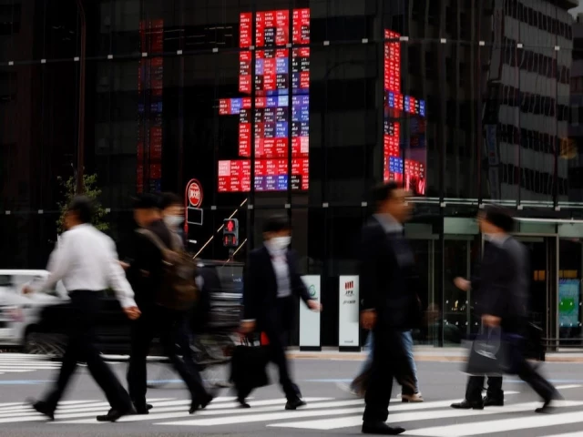 Japan revises up growth outlook on stimulus