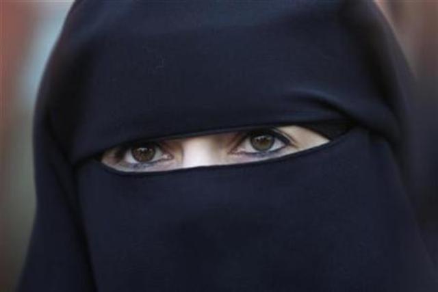 anne an assumed name a 31 year old french woman who has been fined for wearing a niqab while driving speaks during a news conference in nantes western france april 23 2010 photo reuters