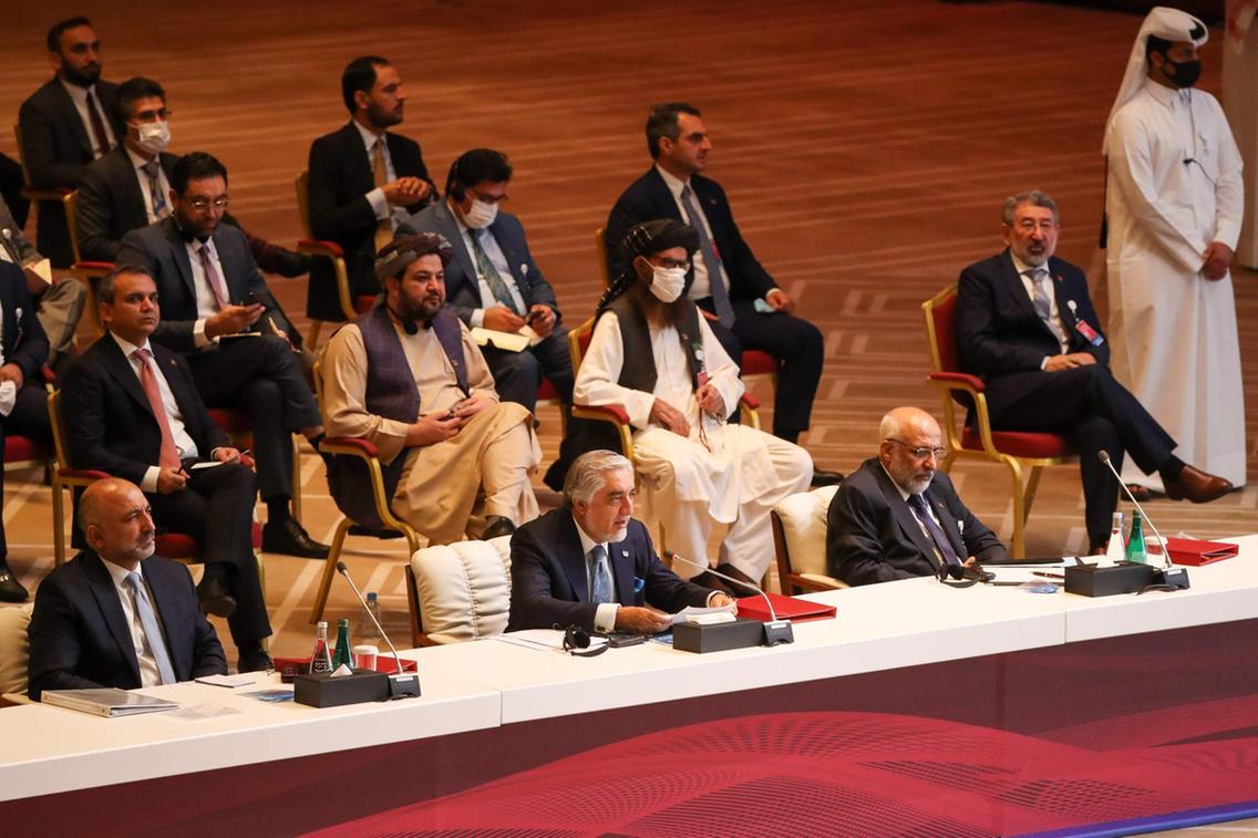 abdullah abdullah centre chairman of afghanistan s high council for national reconciliation speaks the opening session of the peace talks between the afghan government and the taliban in the qatari capital doha afp