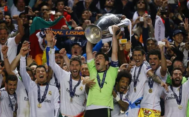 real madrid 039 s captain iker casillas and team celebrate with the trophy after defeating atletico madrid in their champions league final photo reuters real madrid 039 s captain iker casillas and team celebrate with the trophy after defeating atletico madrid in their champions league final photo reuters
