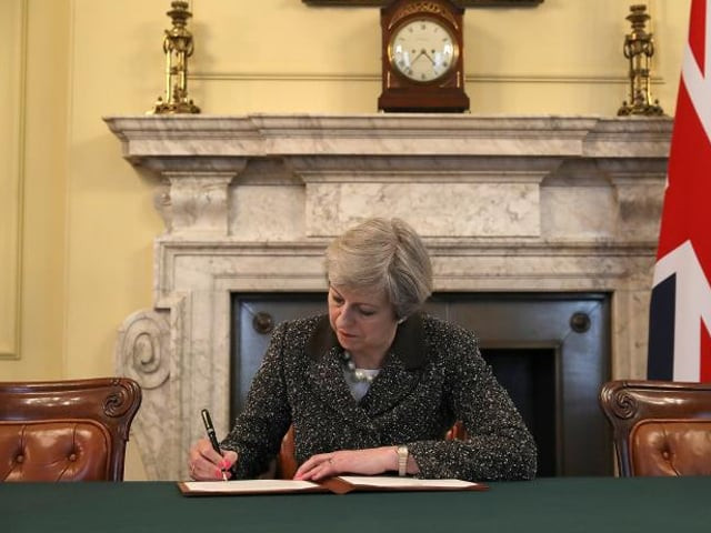 british prime minister theresa may in the cabinet office signs the official letter to european council president donald tusk invoking article 50 and the united kingdom 039 s intention to leave the eu on march 28 2017 in london england photo reuters british prime minister theresa may in the cabinet office signs the official letter to european council president donald tusk invoking article 50 and the united kingdom 039 s intention to leave the eu on march 28 2017 in london england photo reuters