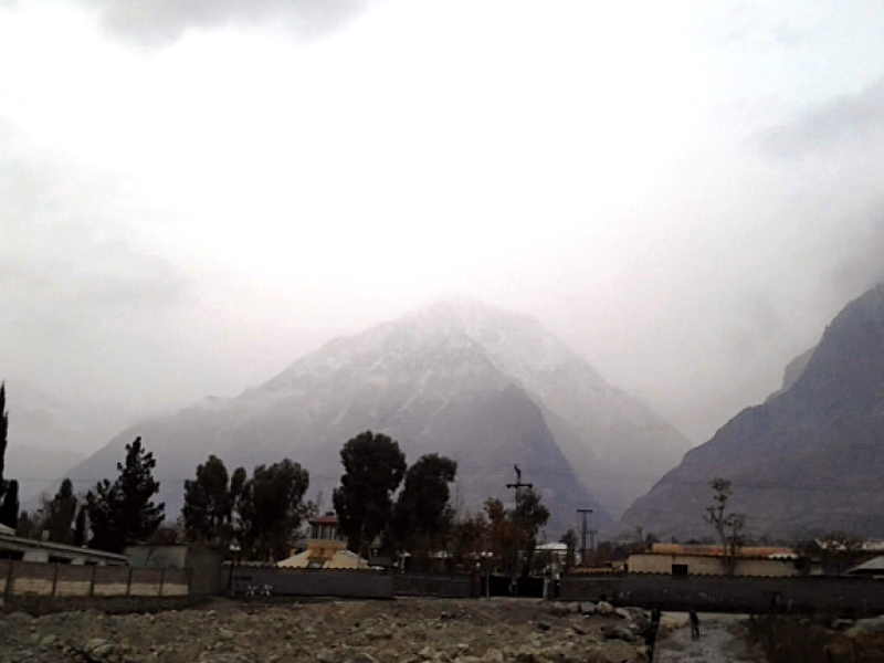 a view of the snow capped peaks in gilgit baltistan photo express