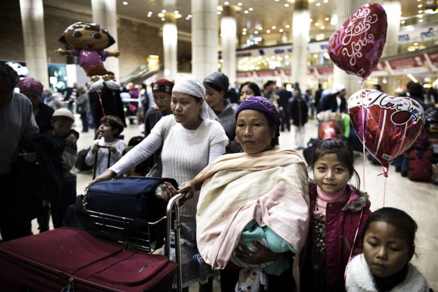 jewish immigrants of the bnei menashe tribe of the jewish community in manipur northeast india wait to be reunited with family members as they arrive at ben gurion airport near tel aviv on december 24 2012 photo afp jewish immigrants of the bnei menashe tribe of the jewish community in manipur northeast india wait to be reunited with family members as they arrive at ben gurion airport near tel aviv on december 24 2012 photo afp