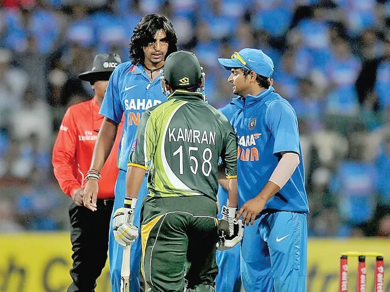akmal and sharma were fined by the icc after the two exchanged angry words during the match in bangalore on tuesday photo bcci akmal and sharma were fined by the icc after the two exchanged angry words during the match in bangalore on tuesday photo bcci