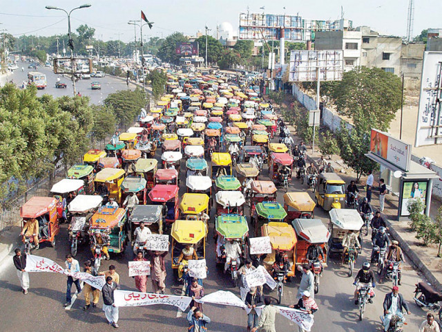 owners of qingqi rickshaws protest in january 2012 against law enforcers rude behaviour towards them photo file owners of qingqi rickshaws protest in january 2012 against law enforcers rude behaviour towards them photo file