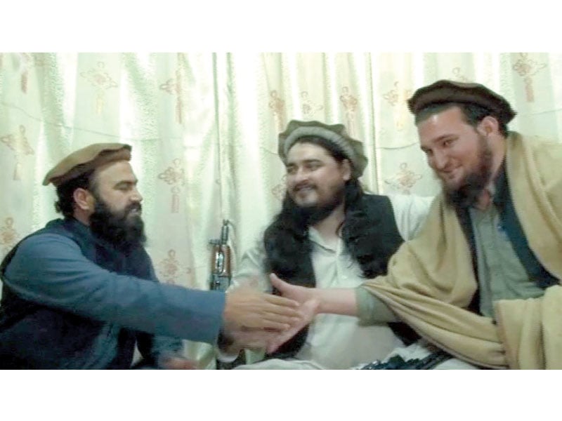 undated video footage shows ttp chief hakimullah mehsud c with his deputy waliur rehman and spokesperson ehsanullah ehsan photo inp