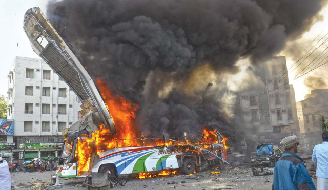 the bus seen in flames with its roof torn off following the explosion photo reuters the bus seen in flames with its roof torn off following the explosion photo reuters