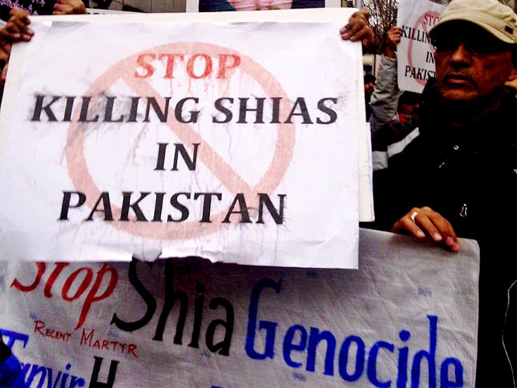 muslim groups demonstrate against the taliban killings of shias in pakistan december 7 2012 during the quot 10 000 souls march quot in new york photo afp