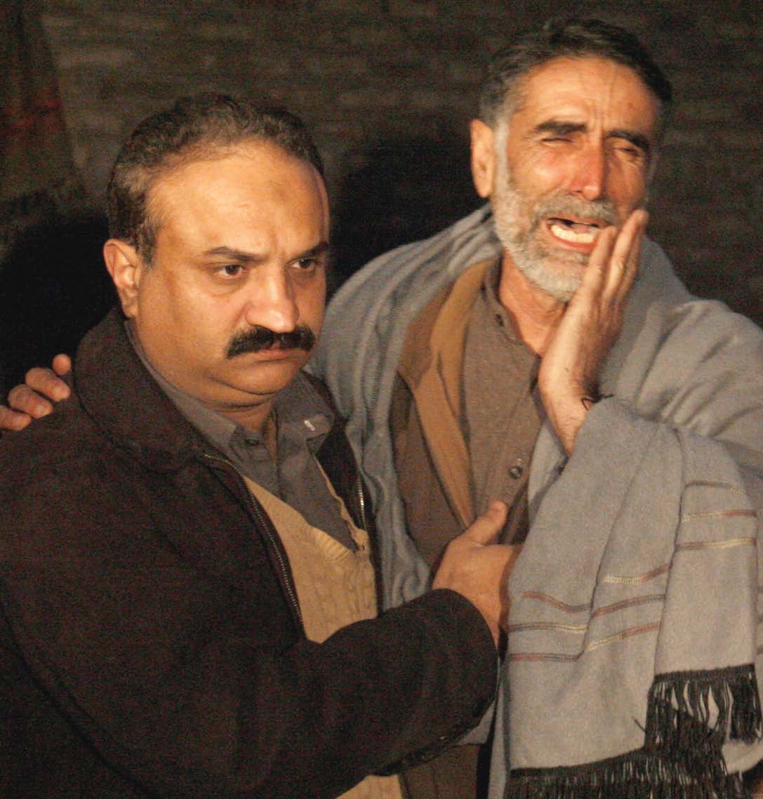 a man mourns his daughter an aid worker who was killed by gunmen at a hospital in swabi photo reuters
