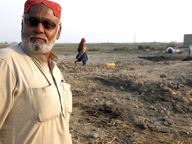 law enforcers allegedly take over siraj ahmed s plot in new karachi after he recovered it from the land mafia photo file dfid law enforcers allegedly take over siraj ahmed s plot in new karachi after he recovered it from the land mafia photo file dfid
