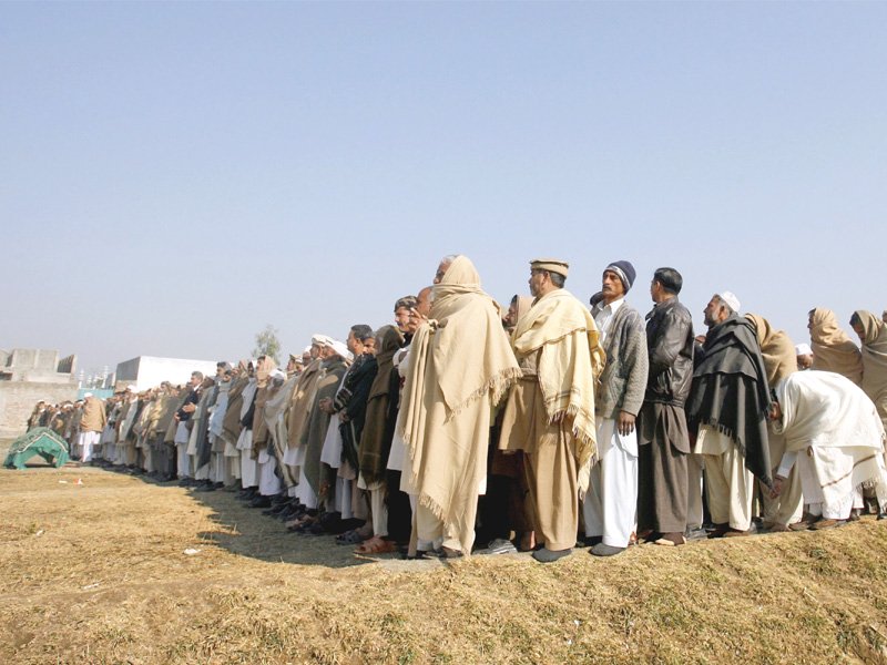 a crowd gathers for funeral prayers for lubna mahmood 26 one of the seven victims of the attack on aid workers photo reuters