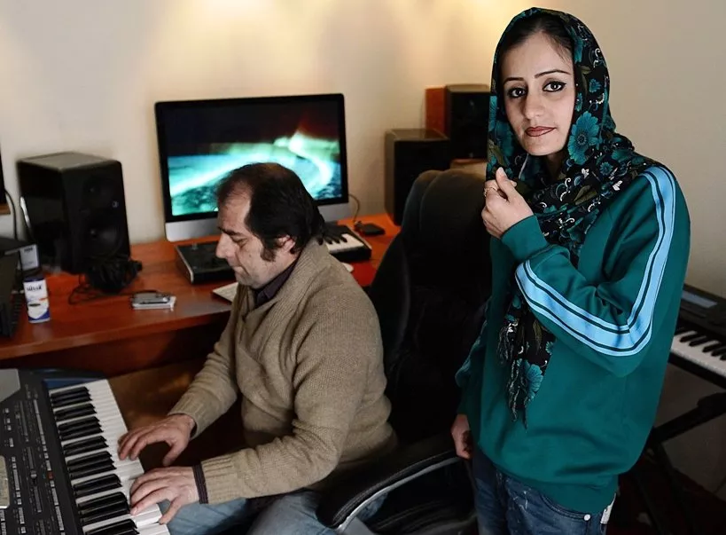 soosan feroz practicing with afghan pop musician farid rastagar at a recording studio in kabul photo afp soosan feroz practicing with afghan pop musician farid rastagar at a recording studio in kabul photo afp