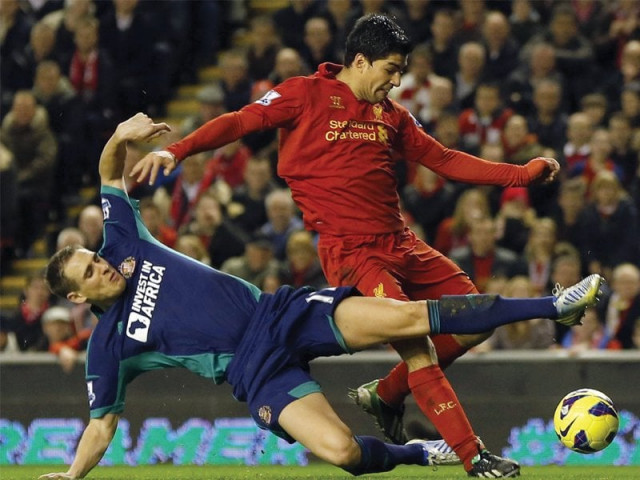 suarez s brace increased his league goals to 15 one less than manchester united s striker robin van persie photo reuters suarez s brace increased his league goals to 15 one less than manchester united s striker robin van persie photo reuters