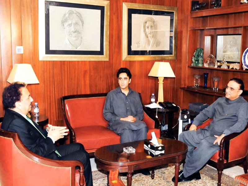 president zardari exchanges views with federal interior minister rehman malik during a meeting at bilawal house in karachi on thursday bilawal bhutto zardari was also present photo ppi