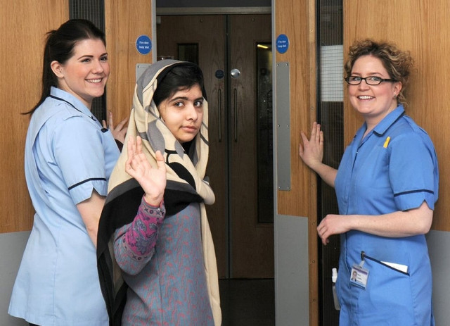 malala yousufzai c waves with nurses as she is discharged from the queen elizabeth hospital in birmingham in this handout photograph released on january 4 2013 photo reuters malala yousufzai c waves with nurses as she is discharged from the queen elizabeth hospital in birmingham in this handout photograph released on january 4 2013 photo reuters