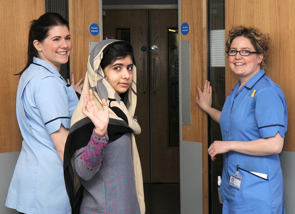 malala yousufzai c waves with nurses as she is discharged from the queen elizabeth hospital in birmingham in this handout photograph released on january 4 2013 photo reuters