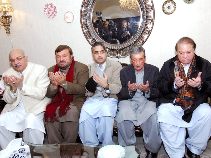 pml n president nawaz sharif offering his condolences on the death of senior k p minister bashir ahmed bilour at the bilour house in peshawar on friday photo online