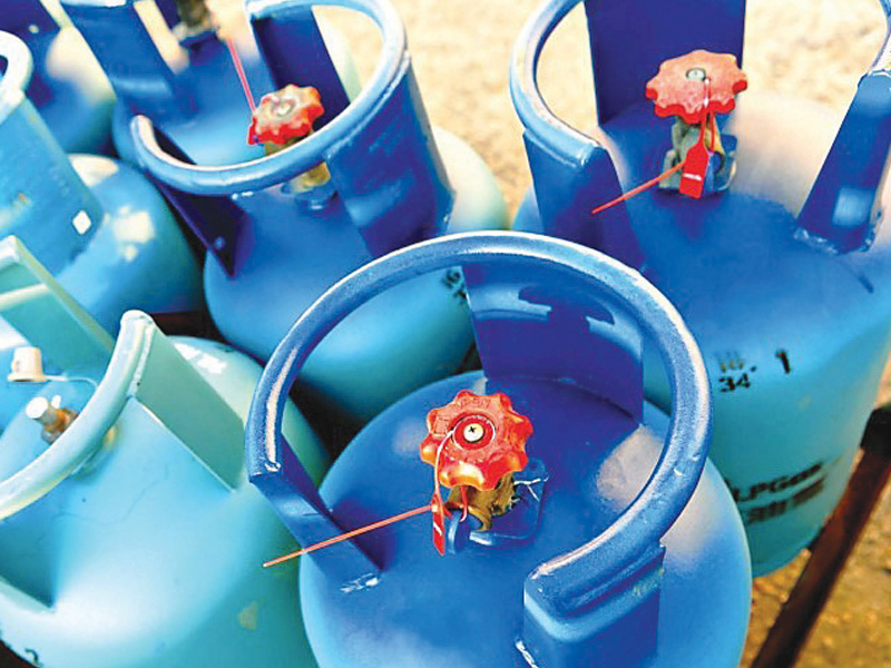 lpg is being sold in the open market through decanting by vendors without any licences or permission photo file