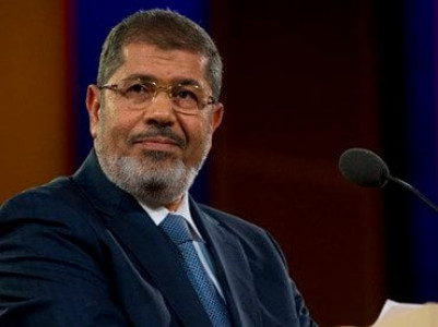 egypt s morsi backs calls for assad war crimes trial