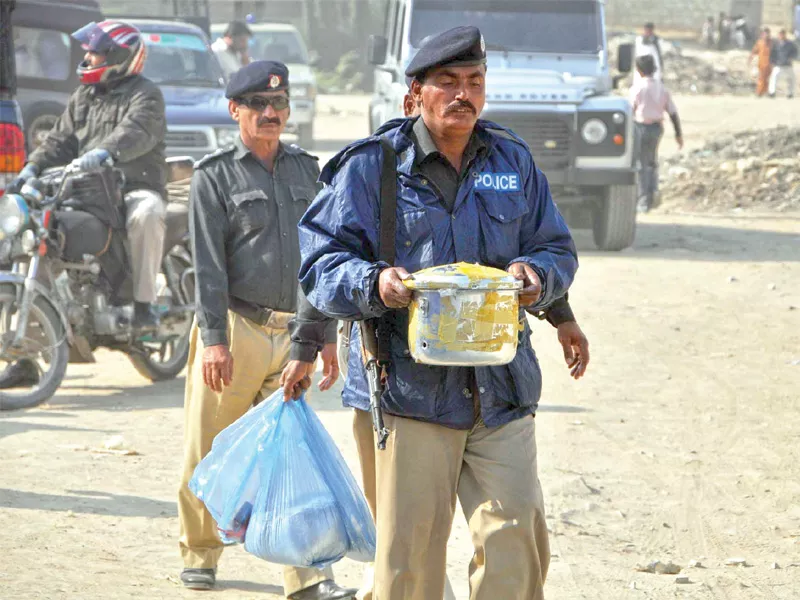 the bomb disposal squad defused a home made explosive device concealed inside a pressure cooker in khawaja ajmair nagri on monday photo ppi the bomb disposal squad defused a home made explosive device concealed inside a pressure cooker in khawaja ajmair nagri on monday photo ppi