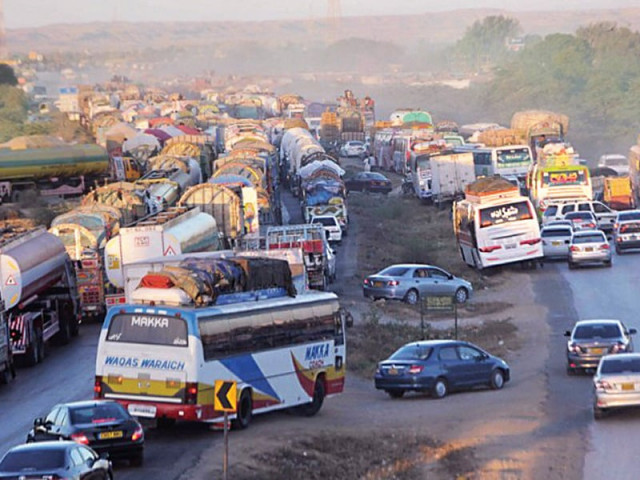 this file picture shows goods carriers hindering the flow of traffic in karachi last month transporters had been on strike for 11 days at that time transporters that carry goods to afghanistan have now been strike since last friday this file picture shows goods carriers hindering the flow of traffic in karachi last month transporters had been on strike for 11 days at that time transporters that carry goods to afghanistan have now been strike since last friday