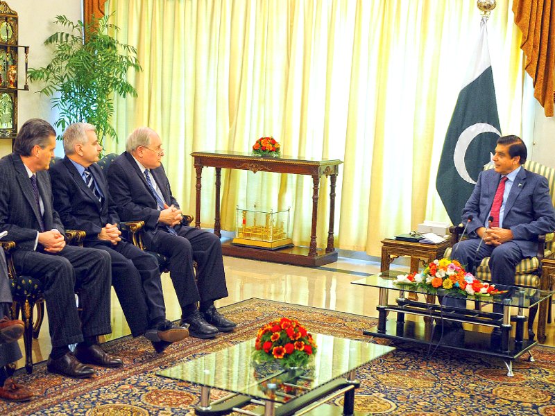 us senator carl levin speaks with prime minister raja pervaiz ashraf during a meeting in islamabad photo afp