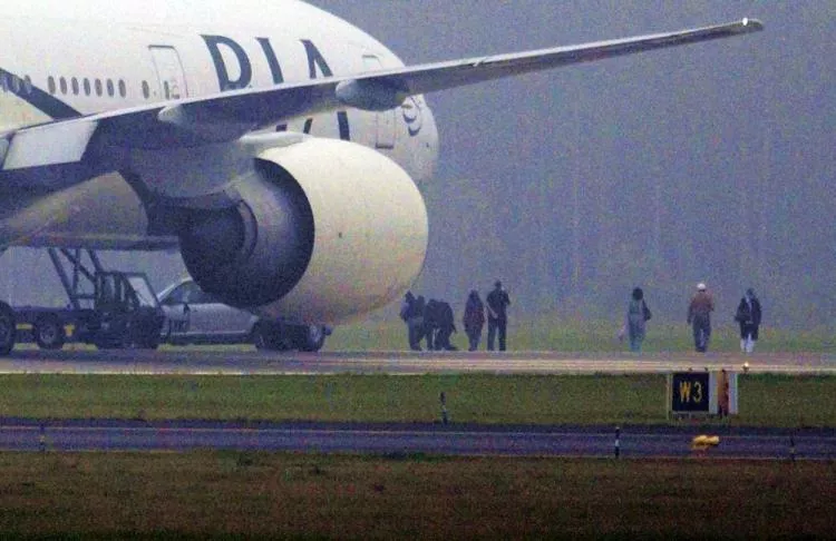 a file photo shows a pia aircraft at an airport photo afp file a file photo shows a pia aircraft at an airport photo afp file