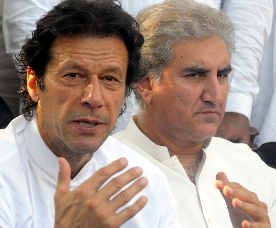 imran khan accuses ppp and pml n of conspiring to bring an interim setup of their choice photo express file